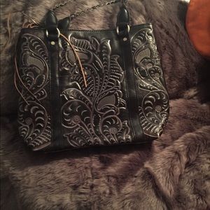 Patricia Nash pocket book very clean